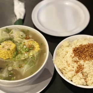 a bowl of soup and a bowl of rice