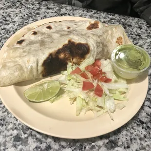 Tortilla con carne deshebrada guisada Stewed beef in sauce flour tortilla
