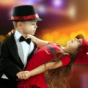 a boy and a girl dancing