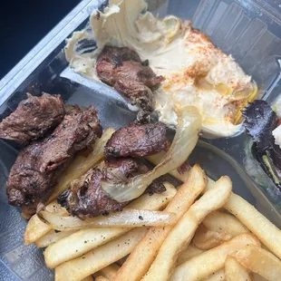 Oily old yucky beef kabob. Lied that it's grilled.