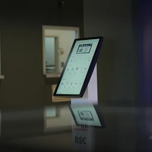 Kiosks for quick ordering and pickup at the register window.