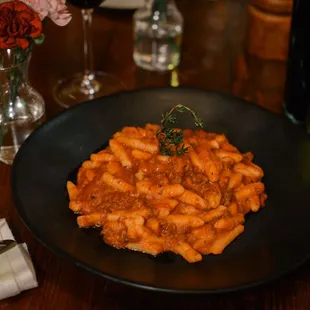 Cavatelli alla Bolognese 
Homemade Ricotta Cavatelli, Classic meat Sauce