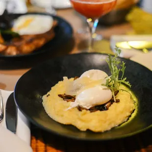 Polenta Funghi 
Cornmeal with Mushroom, Parmesan, Poached Eggs
