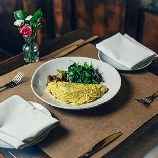 Omelette Parma 
Prosciutto, Asparagus, Fontina Cheese