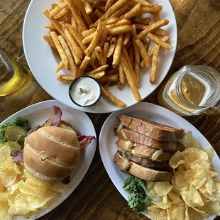 Basket of crispy French fries with seasoned sour cream, thick cut bacon cheeseburger and Sweet onion patty melt.