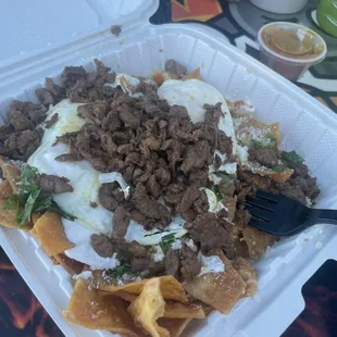 Asada and fries egg Breakfast chillaquilaes