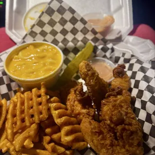 3 piece chicken tender box  Comes with waffle fries, Mac n Cheese, and pickle