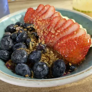 Lava Pitaya Bowl Dragonfruit topped with toasted coconut, bananas, strawberries, Blueberries  You'll enjoy