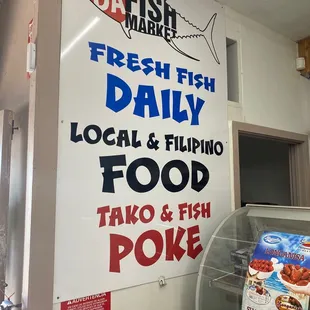 a sign for the fish market