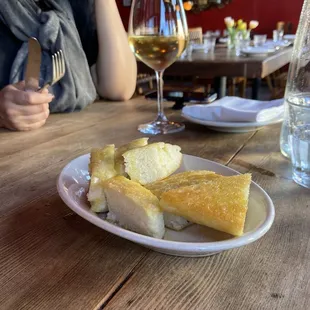 Focaccia Bread - Excellent taste and texture. Almost sponge-like (not complimentary but only $3. My only thing is, it was not warmed at all.