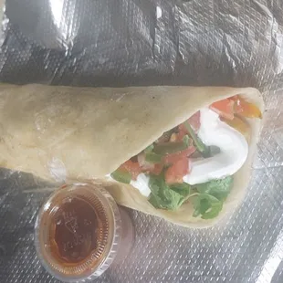 a burrito wrapped in plastic