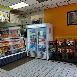 Fresh fruits in the display case, drinks in the refrigerator, and snacks ready to go...