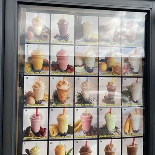 Fresh fruit smoothies' photos shown outside