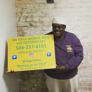 Ben, the owner, with his sign!