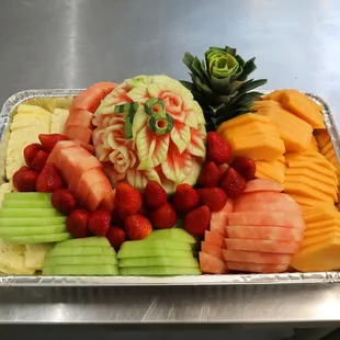 a tray of fruit and vegetables