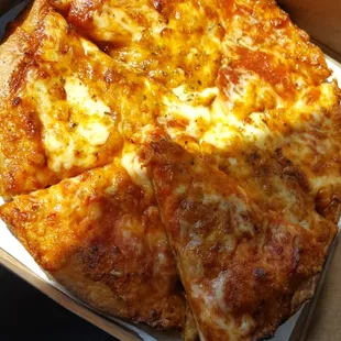 Yummy cheese pizza . From the browned bubbly cheese guessing they use mozzarella and the sauce has nice taste