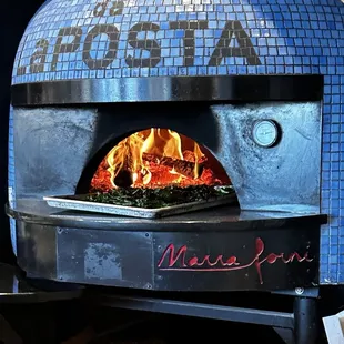 The Crackling Fire inside the Oven @ da LaPosta in Newton MA. The Margherita Voted The Best Pizza in Boston @ 2023 Boston Pizza Festival