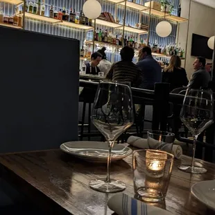 people sitting at a table in a restaurant