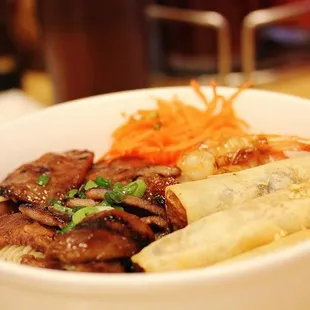 Bun Dac Biet ($8.75): Egg Rolls, Charbroiled Pork and Shrimp on Vermicelli. Good noodles here, just a mediocre pork flavor.