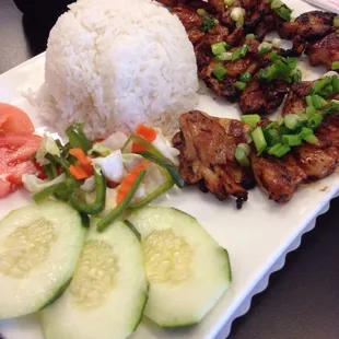Charbroiled chicken and rice.