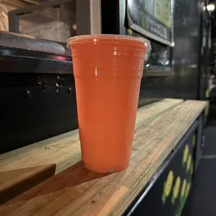 a drink in a plastic cup