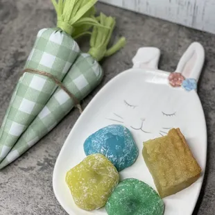 a plate of candy and a carrot