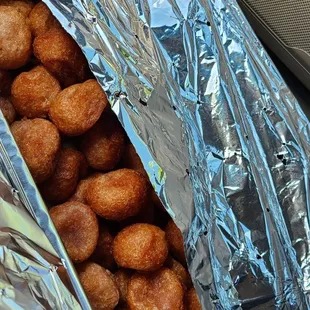 Orders a whole pan of poi mochi balls.