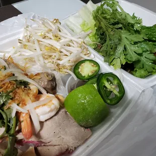 Bountiful feast! One of their crystal noodle soups to go.