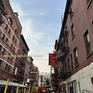people walking down a city street