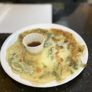 Onion pancake (comes free with the meal) light and crispy! Yummy!
