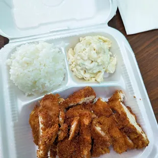 a meal in a styrofoam container