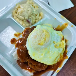 a meal in a styrofoam container