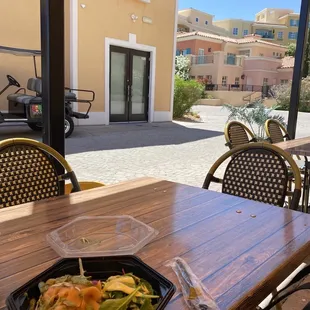 Outdoor table with view into the village.