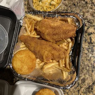 Catfish, fries, cornbread, and Mac and Cheese