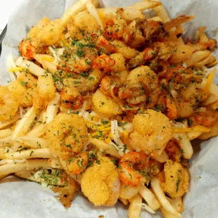 Twisted Seafood Fries- Topped w/ Fried Crawfish &amp; Shrimp, Sautéed Crawfish &amp; Shrimp , Cheddar Queso, Shredded Cheese ...$12.99