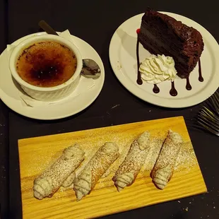 a chocolate dessert and a cup of coffee