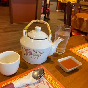 a teapot and a cup of tea