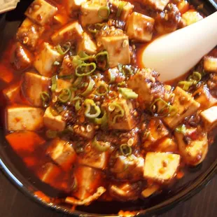 Mapo Tofu. Original Mapo Tofu must be from Sichuan. It must be very spicy with the numb sensation from Sichuan pepper corn.