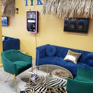 lue couches and zebra print rug