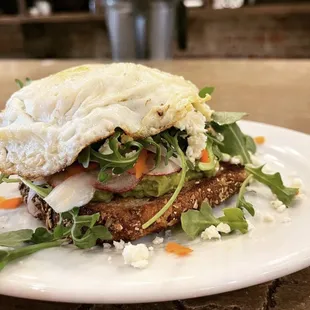 Loaded avocado toast add egg your way