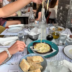 people eating at a restaurant table