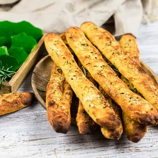 a plate of breadsticks