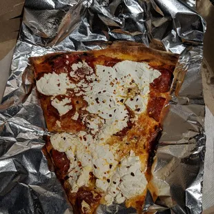 Slice of pepperoni with ricotta added