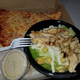 2 cheese slice combo with a grilled chicken Caesar salad. Delicious!