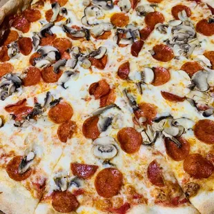 a pepperoni and mushroom pizza