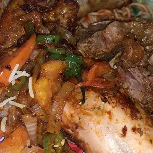 a plate of food with meat and vegetables