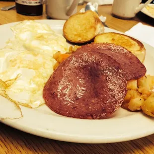 Eggs, salami, hash browns and toast. $3.50. Cooked to perfection, too. You just can't beat this deal