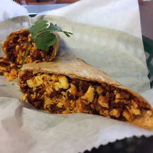 Spicy cured soy sausage scrambled with two eggs, garnished with fresh cilantro! $5.99