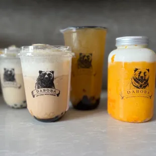 Left to Right - Roasted Brown Sugar Fresh Milk, Roasted Brown Sugar Milk Tea, Passion Fruit Green Tea, and Mango Frapp!