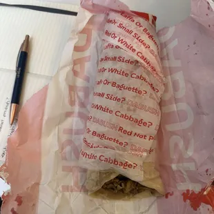 The turkey shwarma laffa. Pen on side for perspective.